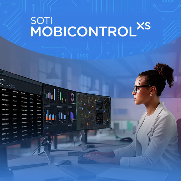 Person working at a desk monitoring multiple data dashboards on large computer screens next to the SOTI MobiControl XS branding.